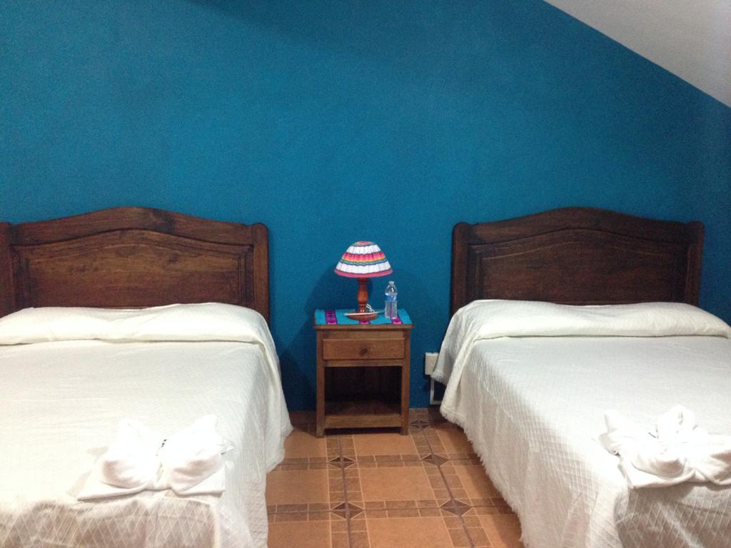 Hotel Posada Las Rosas San Cristóbal de Las Casas Quarto foto